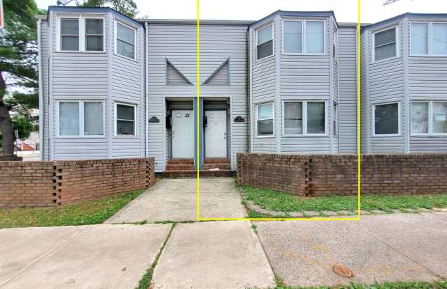 Centrally location, spacious (2-bedroom good for 6 people), finished basement (with two additional rooms) lots of amenities including off-street parking! - 24 Courtlandt Street, New Brunswick, NJ 08901