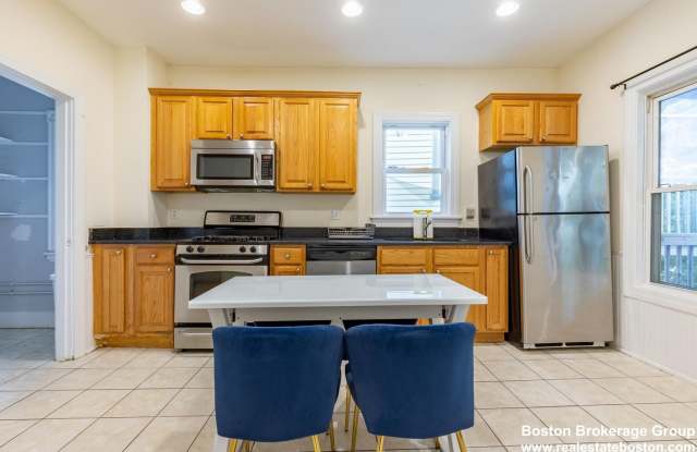 Renovated Apt Near NEU! Laundry in Unit! 1k Rebate Upon closing with Promo photos photos