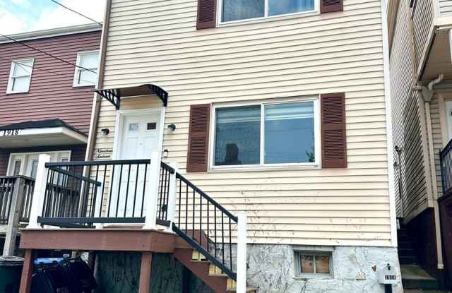 Modern 2 Bed/2 Bath in South Side Slopes - Off-Street Parking, First Floor Laundry - Available Now! photos photos