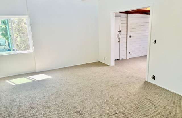 Bright 1.5 bed / 1 bath upstairs apartment with huge private patio  view. Just steps away from Seal Beach! photos photos