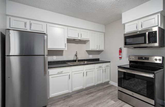 $1049 Renovated 2 bedroom 1 bathroom apartment with wooded views and patio photos photos