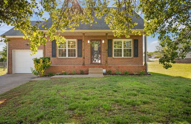 Charming Brick Home with Soaring Ceilings & Updated Finishes! photos photos
