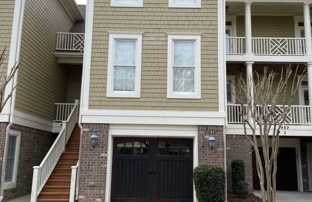 View the Arnold Palmer designed golf course from 3 different levels At River Bluff - 489 River Bluff Drive, Shallotte, NC 28470