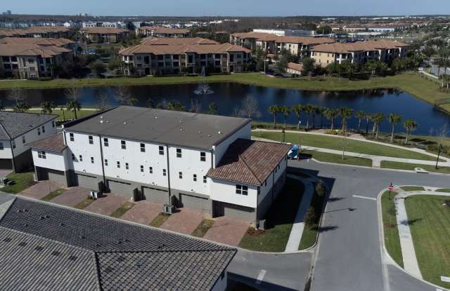 Stunning MOVE-IN READY LAKE VIEW TOWNHOME in. Exquisite 3 bedrooms, 2.5 bathrooms and 2 car garage in the exceptional gated community of Eagle Creek Gallery 4