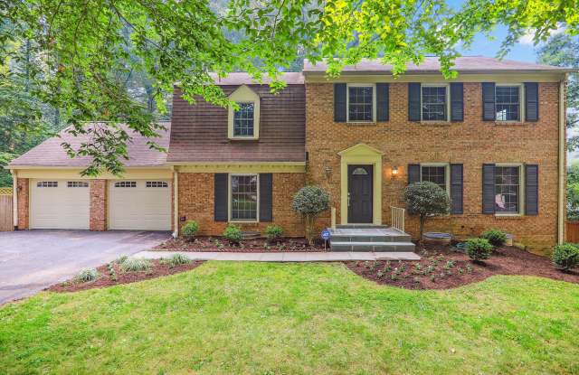 5 BR 4.5 BA home with inground heated pool and extensive hardscape! photos photos