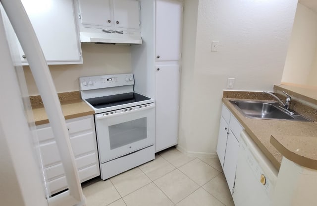1401 VILLAGE BLVD #215 - 1401 Village Boulevard, West Palm Beach, FL 33409