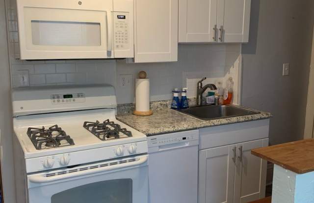 June 2027 ~ Cute 4 bedroom main level duplex unit. Spacious bedrooms. In unit laundry and dishwasher. Gallery 3