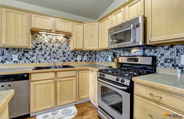 East Anchorage Home with Utilities Included!! Close to JBER! Attached Two Car Garage + Fenced in Yard photos photos