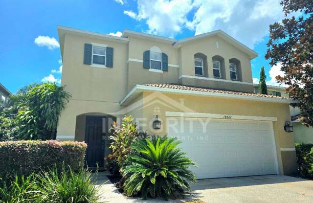 4 Bed/2.5 Bath, 2,103 Sqft - 18822 Sunterra Dr Land O Lakes, FL 34638 photos photos