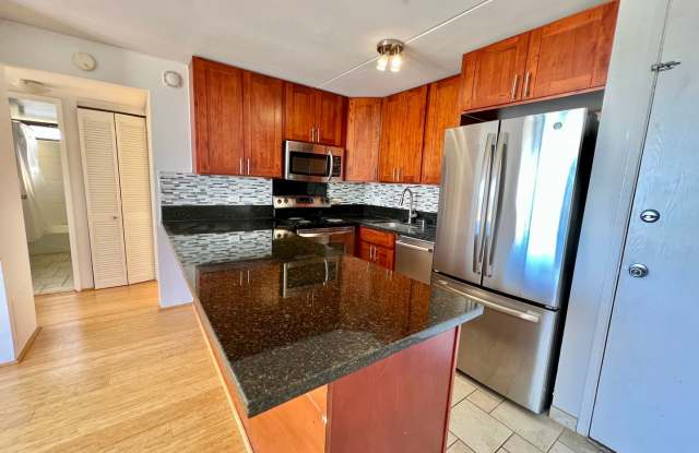 RENOVATED 2 Bedroom, 1 Bathroom, 2 Parking unit with Utilities Included in The Chateau Waikiki with Ocean View! Gallery 3