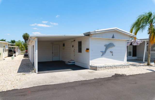 BEAUTIFUL 1 BEDROOM, 1 BATHROOM + BONUS ROOM HOME LOCATED IN THE HIGHLY SOUGHT AFTER 55+ BRADENTON TROPICAL PALMS COMMUNITY! photos photos