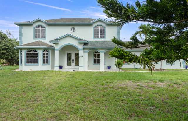 6934 Grapeview Boulevard - 6934 Grapeview Boulevard, The Acreage, FL 33470