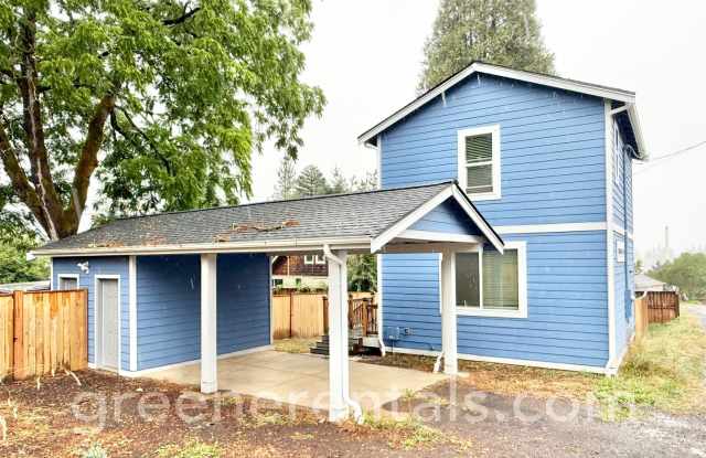 Modern 1-Bedroom Home with Yard, Deck & Carport Gallery 3