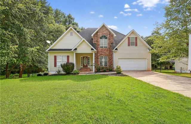 Spacious 5BR Home with Bonus Room & Private Backyard in Stockbridge photos photos