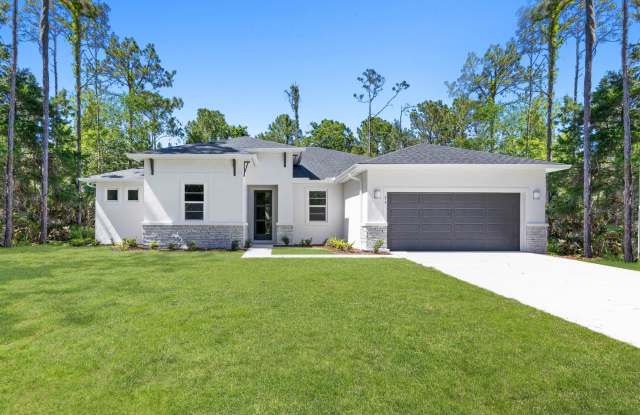 Stunning 4BR Model Home w/ In-Law Suite on Oversized Cul-de-Sac Lot in Palm Coast photos photos