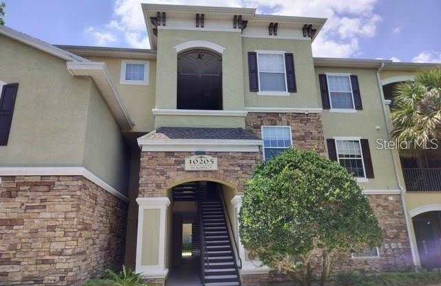 10205 COURTNEY PALMS Boulevard photos photos