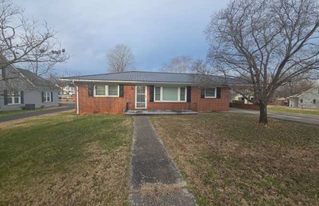 3-Bedroom Home with Fireplace and Covered Patio in Sparta - 141 North Main Street, Sparta, TN 38583 3-Bedroom Home with Fireplace and Covered Patio in Sparta - 141 North Main Street, Sparta, TN 38583