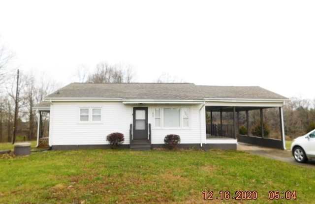 Home with 2 bedrooms, 1 bath, side deck, carport with side porch and detached garage photos photos