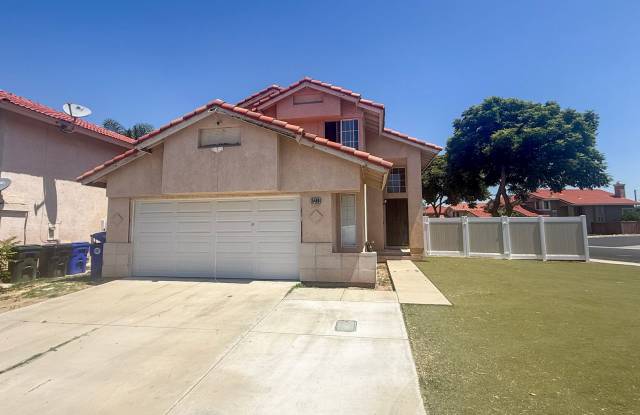 This charming two-story home at 15488 Aveiro Road photos photos