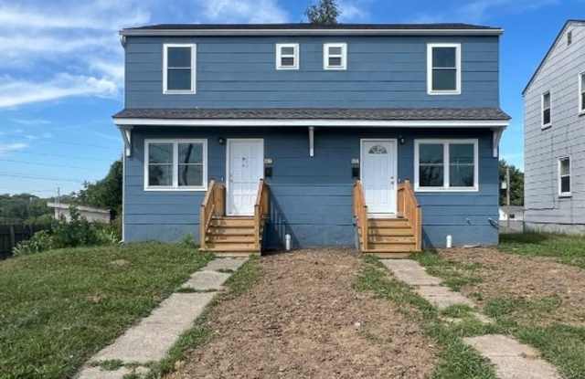 Modern 2-Bed, 1-Bath Duplex with Garage  Basement Storage photos photos
