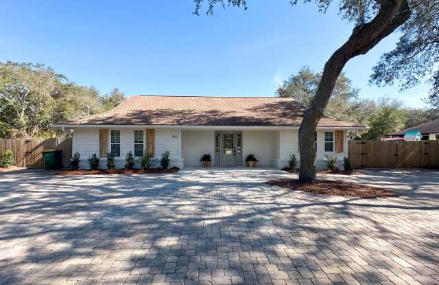 Outdoor living paradise in Destin on this .5 acre lot with large oak trees - 740 Bayou Drive, Destin, FL 32541