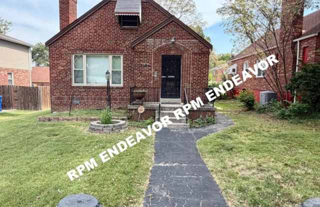 Spacious U-City Home with Finished Lower Level & 2 Car Garage Gallery 3