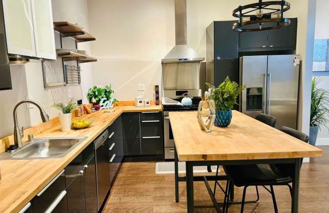 Industrial Chic 1bed/1.5bath condo! 2 gated parking spots! FIRST MONTH FREE!! photos photos