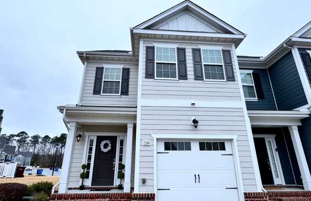 A 1st-Time Rental Available NOW! 3/3.5 Newer End-Unit Townhome w/Garage - Landscaping Included! photos photos