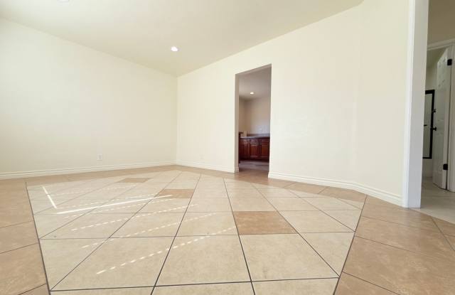 Spacious 4-Bedroom, 2-Bath Gated Home with Garage & Private Backyard Gallery 3