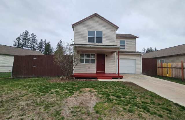 House with fenced yard and garage photos photos