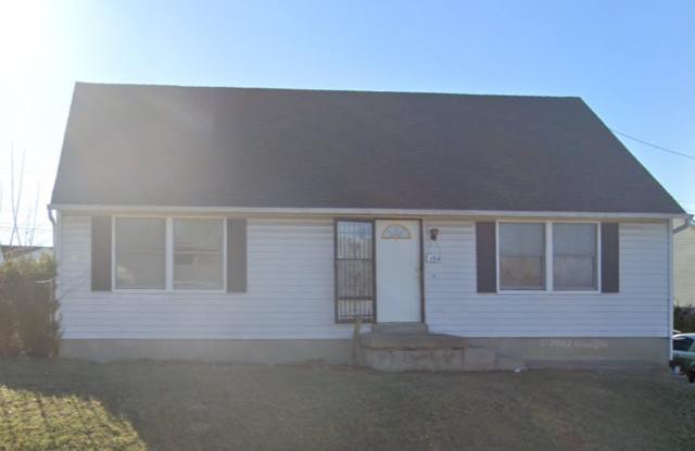 Spacious 4-Bed, 2-Bath Home with Ample Living Space photos photos