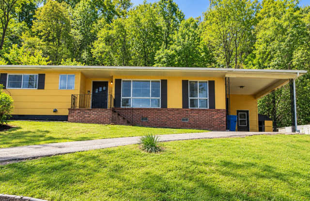 4213 Oakland Terrace N: Renovated 3BR Home with Fenced Yard, Carport & Storage Shed Gallery 1