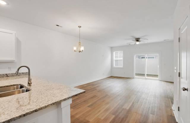 Large 3 story townhome near beach with community POOL and GYM! Gallery 3
