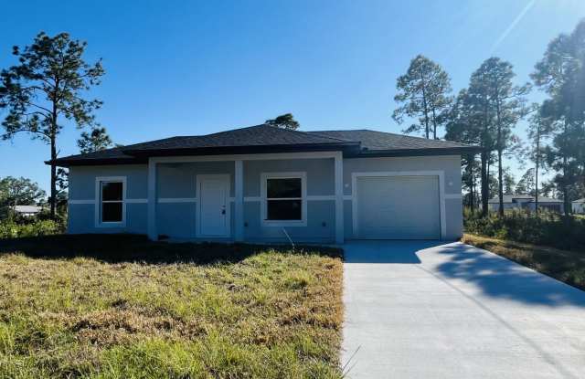 ONE OF A KIND! BRAND NEW 1 Bedroom-1 Bath- 1 Car Garage in Desirable Lehigh Acres! photos photos
