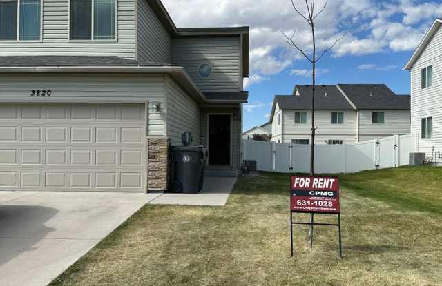 4 BEDROOM, 3.5 BATHROOM, SADDLE RIDGE TWIN HOME WITH 2 CAR ATTACHED GARAGE - 3820 Fire Walker Trail, Cheyenne, WY 82001