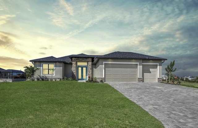 Almost New Construction Waterfront Home in NE Cape Featuring A Pool, Fenced Patio  More! - 109 Northeast 25th Street, Cape Coral, FL 33909