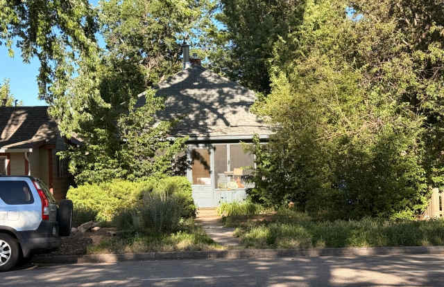 Old Town Charm Awaits | Cozy Cottage Beneath Mature Trees photos photos