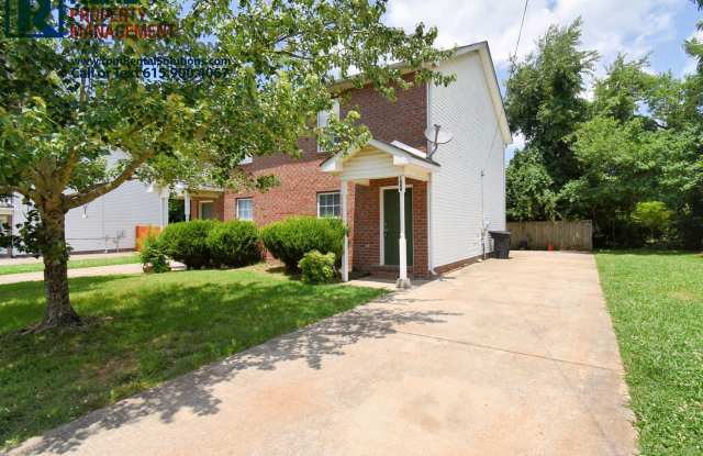 2 Story Brick Duplex- Walk to MTSU! All fresh paint and flooring, washer  dryer  lawncare included! photos photos