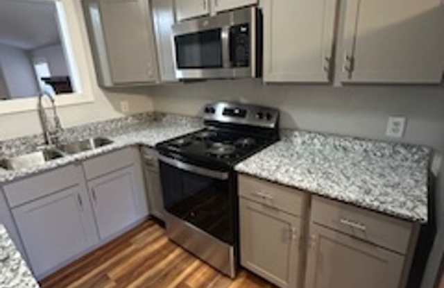 Updated Four Bedroom/Two Bath/Two Car Carport/Fenced/Storage Bldg photos photos