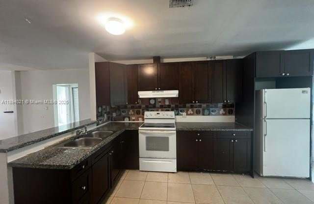 1036 NW 64th St photos photos