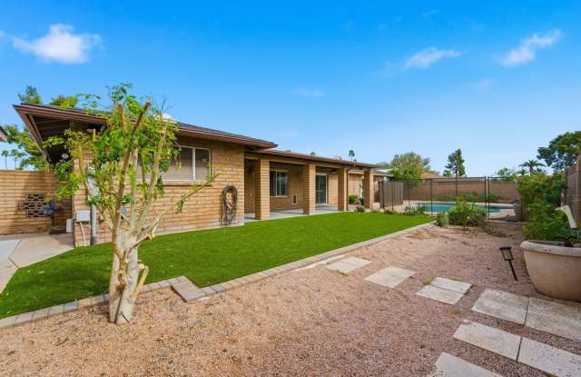 Welcome to this beautiful 4-bedroom, 3-bathroom home in Tempe Arizona! photos photos