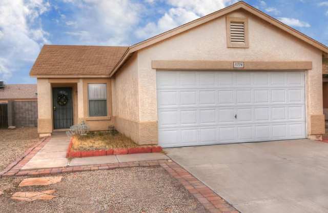 Tile flooring, 2 beds, 1 bath, 964 sqft, 2-car garage - 11774 West Aster Drive, El Mirage, AZ 85335