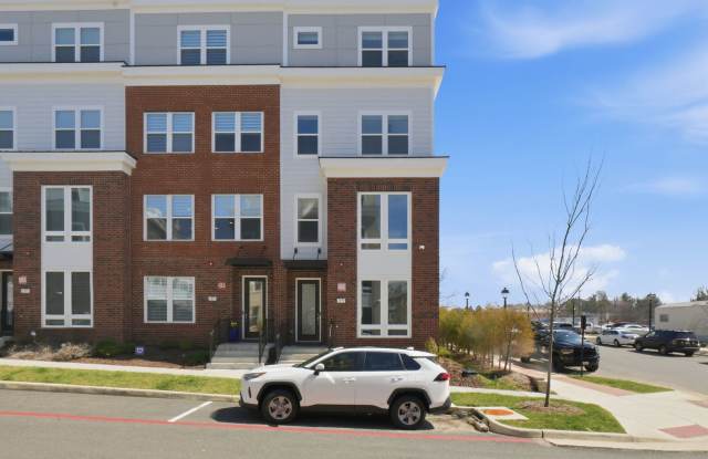 Stunning end-unit, 4-level luxury townhouse in the heart of Fairfax, offering refined finishes, expansive living spaces, and an unbeatable location. photos photos