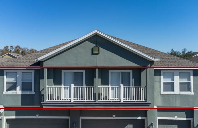 Beautiful second-floor, 2-bedroom, 2-bath condo with peaceful lake views and an attached 1-car garage Gallery 4