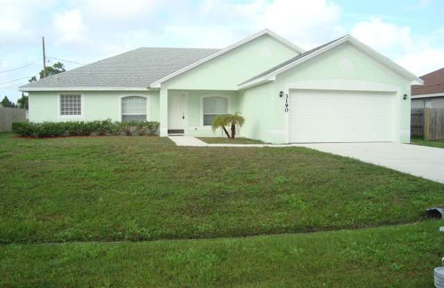 LARGE 3/2/2 WITH 2035 SQ. FEET OF LIVING SPACE NEAR PEACOCK PARK IN PSL photos photos