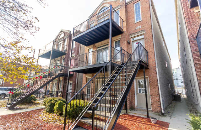 Stunning gut-renovated 3-bedroom, 2-bath condo in South Shore photos photos