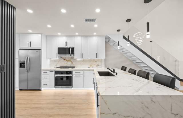 FINISTERRA ON THE LAKE: Remodeled 3 Bedroom 2 Bath 2 Two Story Condo With Step Down Living Room photos photos