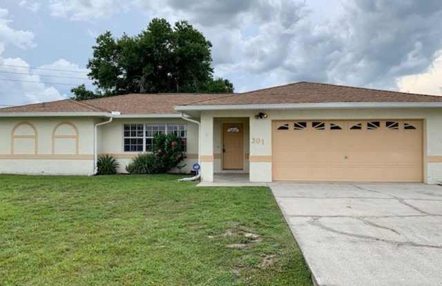 Lovely 3/2 in Poinciana! HUGE fenced yard and NO CARPET! photos photos