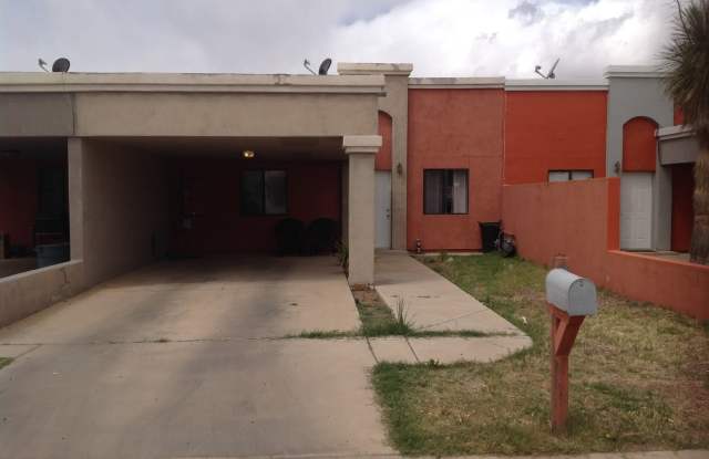 Modern town home with AC. 3/2. Covered, off-street parking, easy care yard. Ample kitchen. Laminate and tile floors. photos photos