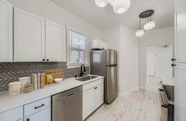 Breathtaking Renovation! Oversized 2 Bed 1 Bath Duplex! Ready Now! Don't Miss Out! photos photos